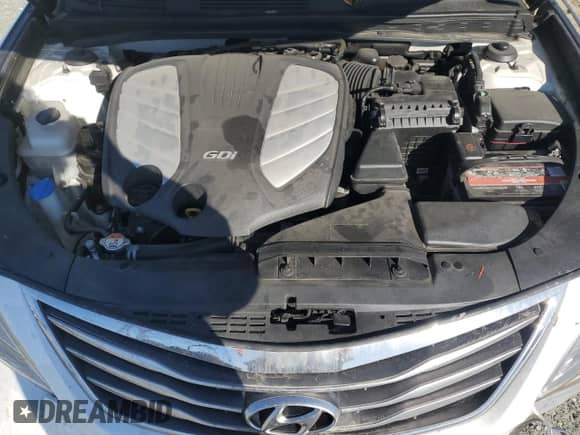 2017 Hyundai Azera Limited z VIN KMHFH4JG5HA590574, wystawiony jako Copart lot #77846934 z przebiegiem Nie podano mil oraz Szkoda całkowita • Salvage title. Historia ofert i sprzedaży dostępna na DreamBid. Obrazek 12.