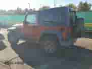 2009 Jeep Wrangler X with VIN 1J4FA24149L707842, listed as a Copart auction lot 85186375 with 142,001 mi miles and Clean title. Bid and sale history available at DreamBid. Image 2.