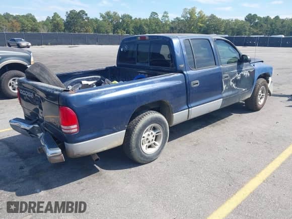 2000 Dodge Dakota Sport with VIN 1B7GL2AX8YS783520, listed as a IAAI auction lot 43277615 with 303,682 mi miles and . Bid and sale history available at DreamBid. Image 4.