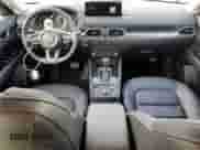 2025 Mazda CX-5 S Preferred z VIN JM3KFBCL3S0634521, wystawiony jako Copart lot #80734935 z przebiegiem 5 091 mil mil oraz Szkoda całkowita • Salvage title. Historia ofert i sprzedaży dostępna na DreamBid. Obrazek 8.