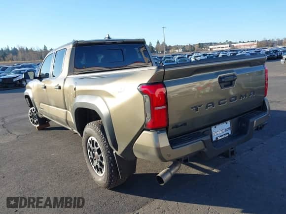 2024 Toyota Tacoma SR5 with VIN 3TMLB5JN6RM048448, listed as a IAAI auction lot 41005722 with 1,562 mi miles and . Bid and sale history available at DreamBid. Image 3.