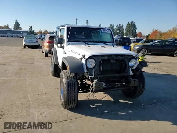 2015 Jeep Wrangler Rubicon z VIN 1C4BJWCG3FL690660, wystawiony jako Copart lot #79571534 z przebiegiem 74 058 mil mil oraz Szkoda całkowita • Salvage title. Historia ofert i sprzedaży dostępna na DreamBid. Obrazek 10.