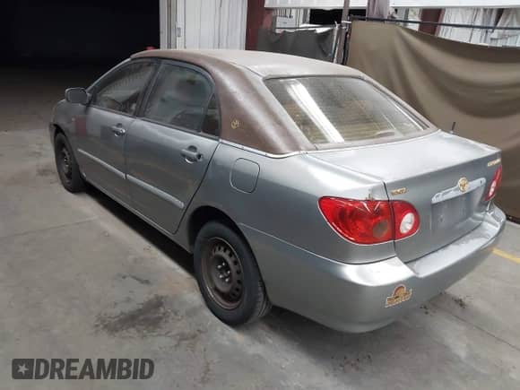 2004 Toyota Corolla CE with VIN JTDBR32E342029415, listed as a IAAI auction lot 43165463 with 210,597 mi miles and . Bid and sale history available at DreamBid. Image 3.