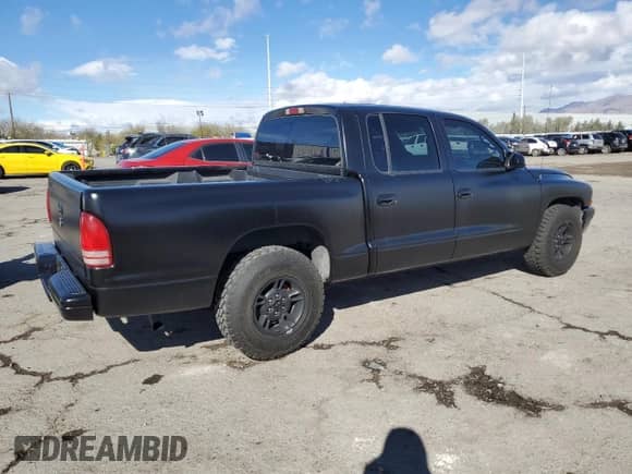 2000 Dodge Dakota Sport с VIN 1B7GL2AXXYS723142, выставлен на аукционе Copart как лот 48067275 с пробегом 186 690 миль миль и Списание • Salvage title. История ставок и продаж доступна на DreamBid. Изображение 3.