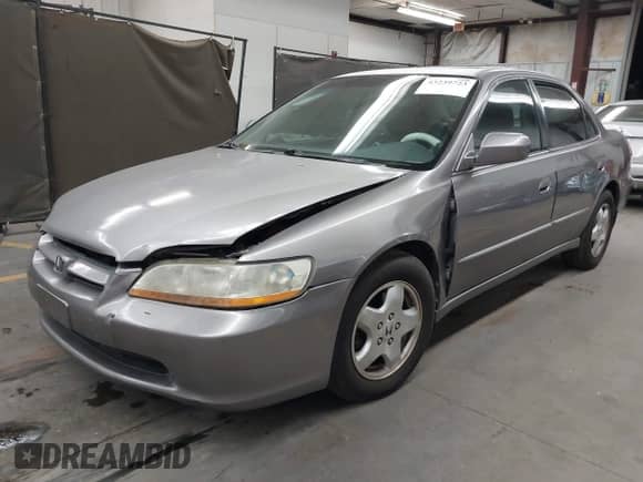 2000 Honda Accord EX z VIN 1HGCG1651YA060426, wystawiony jako IAAI lot #43239723 z przebiegiem 189 075 mil mil oraz . Historia ofert i sprzedaży dostępna na DreamBid. Obrazek 2.