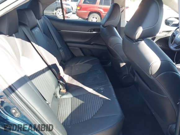 2021 Toyota Camry SE z VIN 4T1T11AK2MU599364, wystawiony jako IAAI lot #43469563 z przebiegiem 69 703 mil mil oraz . Historia ofert i sprzedaży dostępna na DreamBid. Obrazek 8.