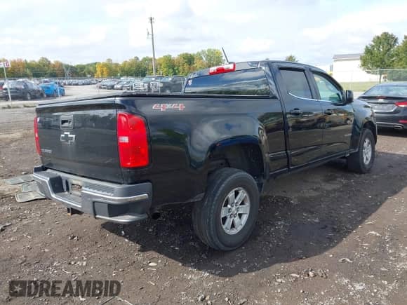 2016 Chevrolet Colorado 4WD WT z VIN 1GCGTBE30G1379817, wystawiony jako IAAI lot #43284954 z przebiegiem 88 749 mil mil oraz . Historia ofert i sprzedaży dostępna na DreamBid. Obrazek 4.