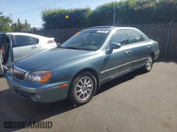 2002 Hyundai XG L with VIN KMHFU45E12A206222, listed as a Copart auction lot 57001405 with 89,116 mi miles and Clean title. Bid and sale history available at DreamBid. Image 1.