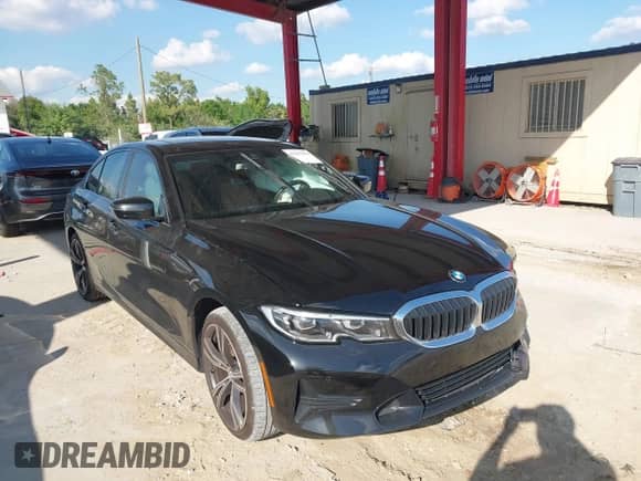 2022 BMW 3 Series 330i with VIN WBA5R1C05NFL77244, listed as a IAAI auction lot 41667834 with 38,964 mi miles and . Bid and sale history available at DreamBid. Image 1.