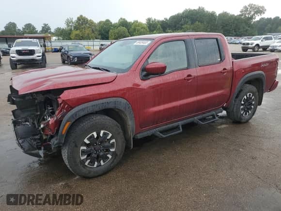 2023 Nissan Frontier Pro-4X z VIN 1N6ED1EK9PN607454, wystawiony jako Copart lot #69409465 z przebiegiem 42 357 mil mil oraz Szkoda całkowita • Salvage title. Historia ofert i sprzedaży dostępna na DreamBid. Obrazek 1.