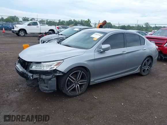 2017 Honda Accord Touring with VIN 1HGCR3F9XHA034660, listed as a IAAI auction lot 42822364 with 139,952 mi miles and . Bid and sale history available at DreamBid. Image 18.