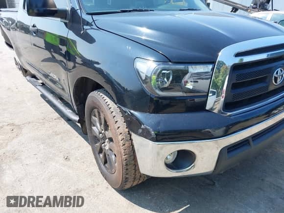 2012 Toyota Tundra z VIN 5TFRU5F18CX026186, wystawiony jako IAAI lot #42414319 z przebiegiem 216 128 mil mil oraz . Historia ofert i sprzedaży dostępna na DreamBid. Obrazek 18.