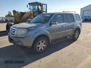 2009 Honda Pilot Touring with VIN 5FNYF38809B003718, listed as a Copart auction lot 82214735 with 163,001 mi miles and Clean title. Bid and sale history available at DreamBid. Image 1.