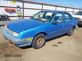 1991 Dodge Shadow with VIN 1B3XP28D9MN527218, listed as a IAAI auction lot 42013553 with 161,590 mi miles and . Bid and sale history available at DreamBid. Image 2.