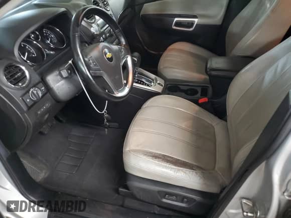 2013 Chevrolet Captiva Sport LTZ с VIN 3GNAL4EK0DS598187, выставлен на аукционе Copart как лот 78989134 с пробегом 107 198 миль миль и Списание • Salvage title. История ставок и продаж доступна на DreamBid. Изображение 7.