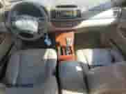 2006 Toyota Camry XLE с VIN 4T1BF30K96U624032, выставлен на аукционе Copart как лот 84063725 с пробегом 232 488 миль миль и Списание • Salvage title. История ставок и продаж доступна на DreamBid. Изображение 8.