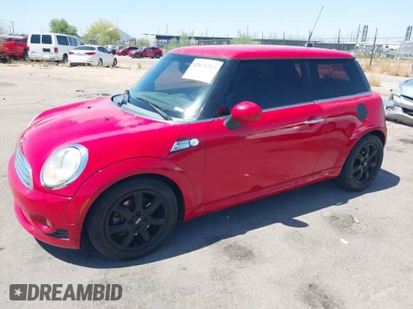 2010 MINI Hardtop with VIN WMWMF3C53ATZ64405, listed as a IAAI auction lot 42673213 with 135,765 mi miles and . Bid and sale history available at DreamBid. Image 2.