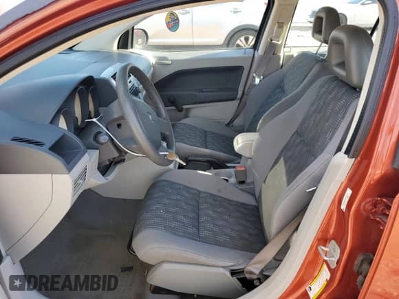 2007 Dodge Caliber with VIN 1B3HB28B97D192747, listed as a Copart auction lot 52386615 with 167,439 mi miles and Salvage title. Bid and sale history available at DreamBid. Image 7.