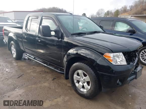 2013 Nissan Frontier SV with VIN 1N6AD0FV2DN734933, listed as a IAAI auction lot 40930502 with 89,966 mi miles and . Bid and sale history available at DreamBid. Image 1.