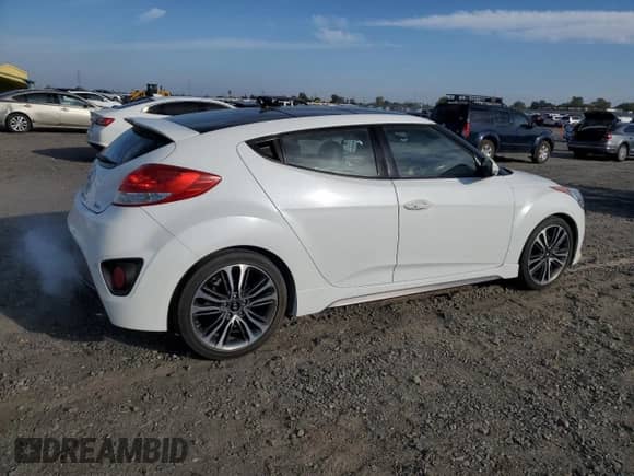 2016 Hyundai Veloster Turbo with VIN KMHTC6AEXGU289985, listed as a Copart auction lot 82231985 with 194,899 mi miles and Salvage title. Bid and sale history available at DreamBid. Image 3.