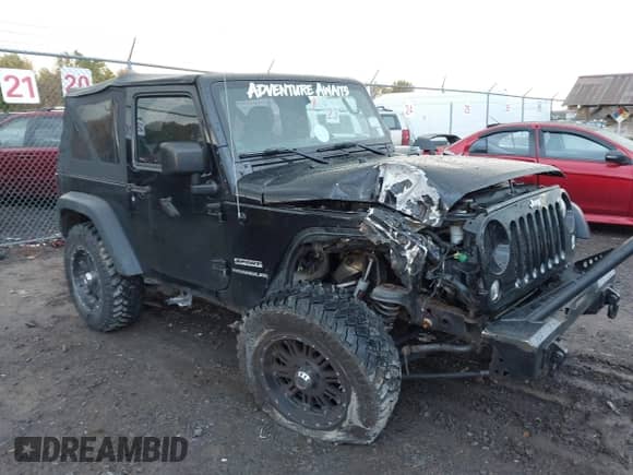 2014 Jeep Wrangler Sport z VIN 1C4AJWAG1EL327481, wystawiony jako IAAI lot #43527216 z przebiegiem 162 278 mil mil oraz . Historia ofert i sprzedaży dostępna na DreamBid. Obrazek 1.
