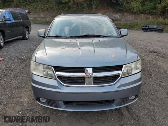 2010 Dodge Journey SXT with VIN 3D4PG5FV7AT117950, listed as a Copart auction lot 82028075 with 65,015 mi miles and Salvage title. Bid and sale history available at DreamBid. Image 5.