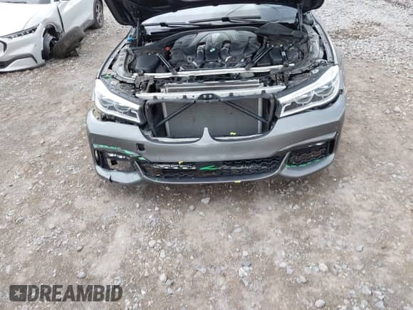 2016 BMW 7 Series 750i xDrive with VIN WBA7F2C58GG415114, listed as a IAAI auction lot 42627693 with 87,908 mi miles and . Bid and sale history available at DreamBid. Image 6.