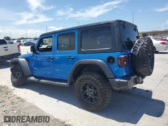 2024 Jeep Wrangler Willys with VIN 1C4PJXDG0RW289094, listed as a Copart auction lot 65085045 with 1,272 mi miles and Salvage title. Bid and sale history available at DreamBid. Image 2.