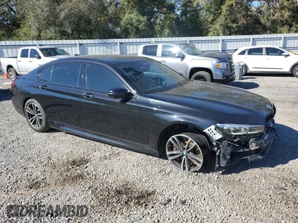 2022 BMW 7 Series 750i xDrive with VIN WBA7U2C05NCH77127, listed as a Copart auction lot 83849074 with 35,079 mi miles and Salvage title. Bid and sale history available at DreamBid. Image 4.