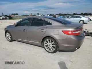 2012 Hyundai Azera с VIN KMHFH4JG1CA194151, выставлен на аукционе Copart как лот 72110094 с пробегом 98 178 миль миль и Списание • Salvage title. История ставок и продаж доступна на DreamBid. Изображение 2.