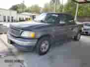 2002 Ford F-150 XLT с VIN 1FTRW07L72KE08265, выставлен на аукционе Copart как лот 84477595 с пробегом 279 293 миль миль и Чистый • Clean title. История ставок и продаж доступна на DreamBid. Изображение 1.