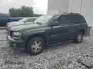 2003 Chevrolet TrailBlazer LT with VIN 1GNDS13S632159748, listed as a Copart auction lot 59325555 with 174,740 mi miles and Salvage title. Bid and sale history available at DreamBid. Image 1.