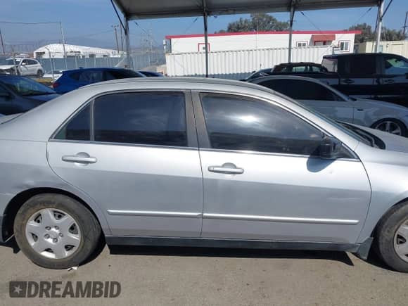 2003 Honda Accord LX with VIN 1HGCM56463A045842, listed as a IAAI auction lot 42104299 with Not provided miles and . Bid and sale history available at DreamBid. Image 13.