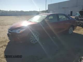 2016 Toyota Camry XLE with VIN 4T1BK1FK7GU569699, listed as a Copart auction lot 85123285 with 57,219 mi miles and Salvage title. Bid and sale history available at DreamBid. Image 1.