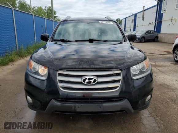 2012 Hyundai Santa Fe GLS с VIN 5XYZGDAGXCG131196, выставлен на аукционе Copart как лот 64174555 с пробегом 253 263 миль миль и Чистый • Clean title. История ставок и продаж доступна на DreamBid. Изображение 5.