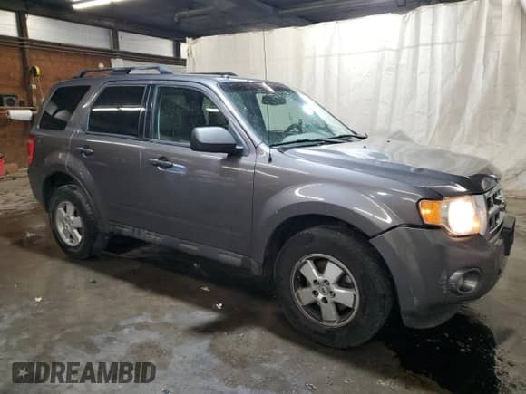2011 Ford Escape XLT с VIN 1FMCU9D77BKC36354, выставлен на аукционе Copart как лот 81712605 с пробегом 251 168 миль миль и Списание • Salvage title. История ставок и продаж доступна на DreamBid. Изображение 4.