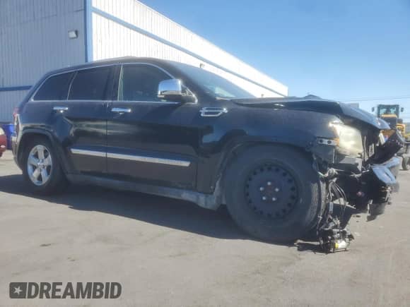 2012 Jeep Grand Cherokee Overland z VIN 1C4RJFCGXCC187959, wystawiony jako Copart lot #85349525 z przebiegiem 105 327 mil mil oraz Szkoda całkowita • Salvage title. Historia ofert i sprzedaży dostępna na DreamBid. Obrazek 4.