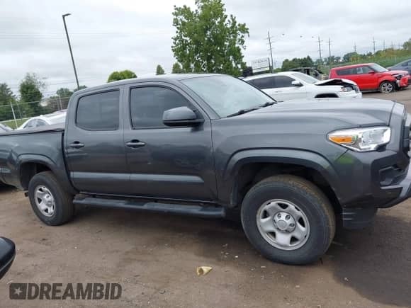 2023 Toyota Tacoma SR with VIN 3TMCZ5ANXPM538495, listed as a IAAI auction lot 42993850 with 41,728 mi miles and . Bid and sale history available at DreamBid. Image 14.