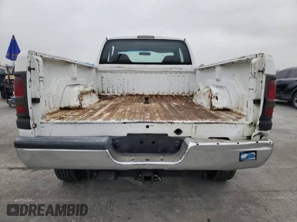 1998 Dodge 2500 с VIN 3B7KF22D7WG138206, выставлен на аукционе Copart как лот 53313395 с пробегом 333 521 миль миль и Списание • Salvage title. История ставок и продаж доступна на DreamBid. Изображение 6.