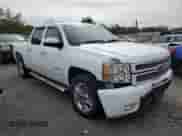 2012 Chevrolet Silverado 1500 LTZ with VIN 1GCPKTE71CF124456, listed as a Copart auction lot 83750495 with 158,377 mi miles and Salvage title. Bid and sale history available at DreamBid. Image 4.