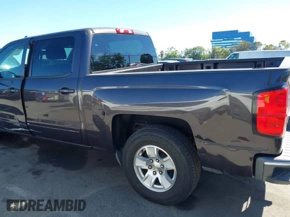 2015 Chevrolet Silverado 1500 LT z VIN 3GCPCREC4FG361748, wystawiony jako IAAI lot #43362916 z przebiegiem 193 396 mil mil oraz . Historia ofert i sprzedaży dostępna na DreamBid. Obrazek 19.