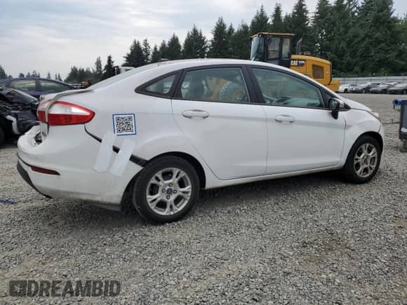 2014 Ford Fiesta SE с VIN 3FADP4BJ3EM228286, выставлен на аукционе Copart как лот 70353915 с пробегом 92 955 миль миль и Списание • Salvage title. История ставок и продаж доступна на DreamBid. Изображение 3.