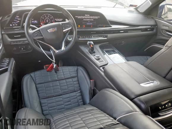 2024 Cadillac Escalade AWD V-Series z VIN 1GYS4HK97RR159978, wystawiony jako Copart lot #61041575 z przebiegiem Nie podano mil oraz Szkoda całkowita • Salvage title. Historia ofert i sprzedaży dostępna na DreamBid. Obrazek 8.