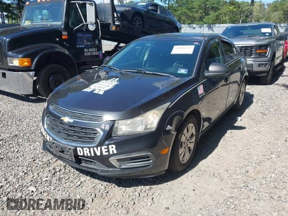 2015 Chevrolet Cruze LS with VIN 1G1PA5SG6F7189703, listed as a IAAI auction lot 43066243 with 240,880 mi miles and . Bid and sale history available at DreamBid. Image 2.