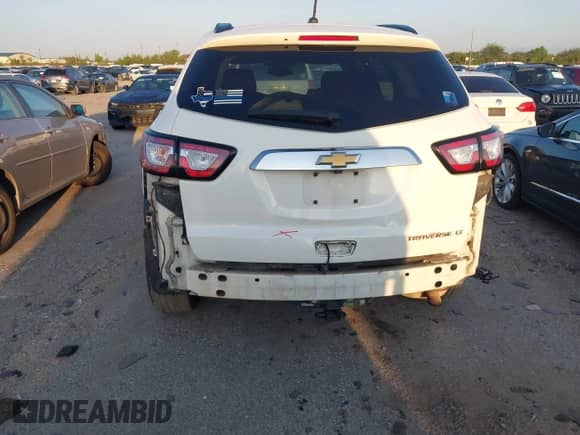 2013 Chevrolet Traverse LT z VIN 1GNKRGKD6DJ122960, wystawiony jako IAAI lot #42909542 z przebiegiem 266 289 mil mil oraz . Historia ofert i sprzedaży dostępna na DreamBid. Obrazek 6.