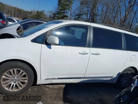 2013 Toyota Sienna XLE AAS with VIN 5TDYK3DC1DS341977, listed as a IAAI auction lot 41418311 with Not provided miles and . Bid and sale history available at DreamBid. Image 13.
