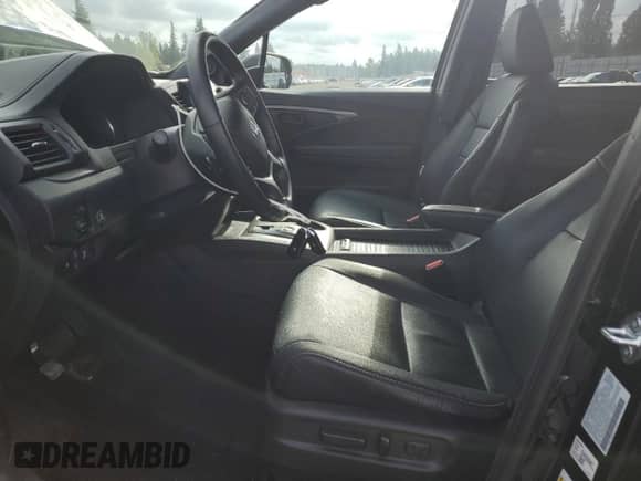 2023 Honda Passport EX-L with VIN 5FNYF8H53PB026202, listed as a Copart auction lot 82571405 with 45,325 mi miles and Salvage title. Bid and sale history available at DreamBid. Image 7.