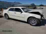 2008 Chrysler 300 LX with VIN 2C3KA43R38H127084, listed as a Copart auction lot 60160345 with 162,597 mi miles and Salvage title. Bid and sale history available at DreamBid. Image 4.