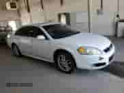 2012 Chevrolet Impala LTZ with VIN 2G1WC5E32C1320441, listed as a Copart auction lot 71558515 with 200,170 mi miles and Salvage title. Bid and sale history available at DreamBid. Image 4.