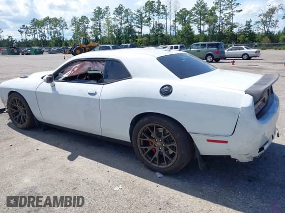 2016 Dodge Challenger SRT Hellcat with VIN 2C3CDZC98GH344394, listed as a IAAI auction lot 43309335 with 64,278 mi miles and . Bid and sale history available at DreamBid. Image 3.